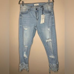 Light blue distressed jeans